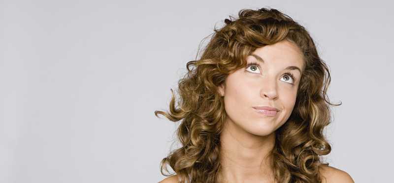 Young woman looking perplexed
