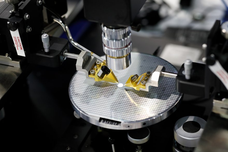 Semiconductor chip being manufactured in factory.
