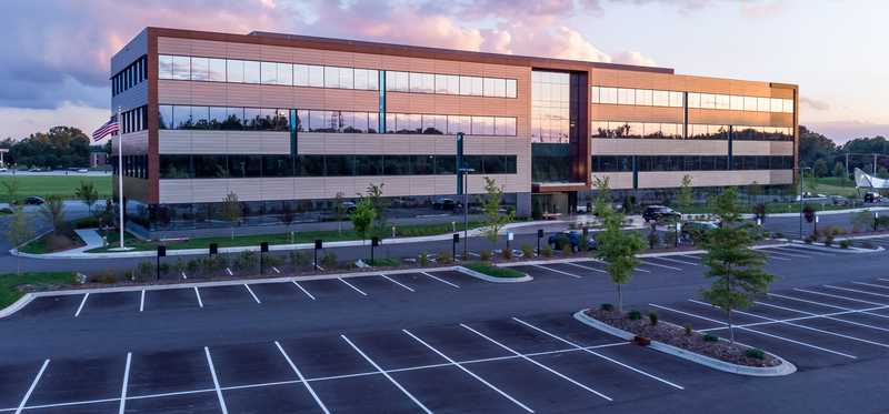 Large office building and almost empty parking lot