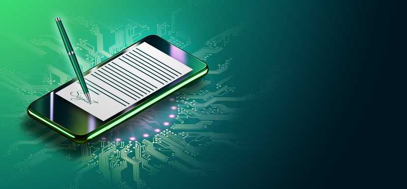 Pen signing electronic document on tablet against green background