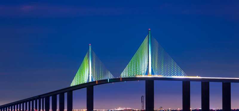 A night shot of Florida's Tampa Skyway Bridge.