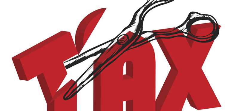 A pair of scissors cut through the word Tax.