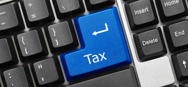 Keyboard with blue tax key.