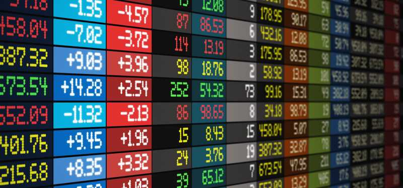 A stock trading screen with numbers and different colors.