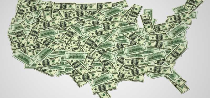 U.S. map outline made up of money.