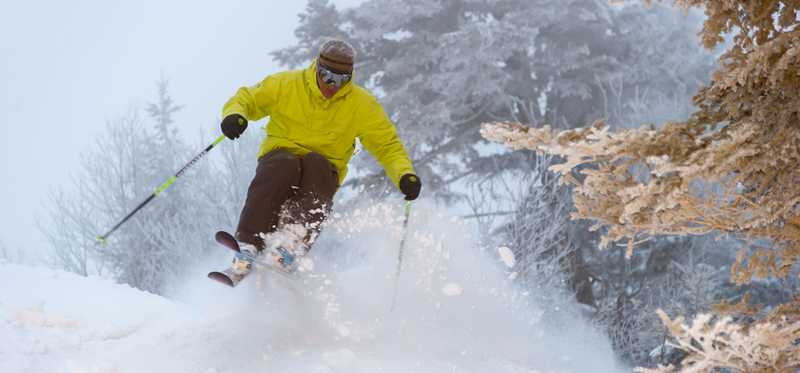 An action shot of a person skiing.