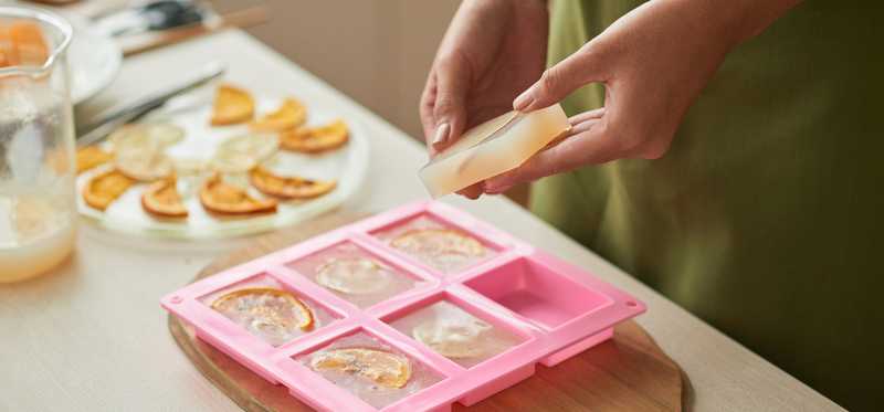 Person making homemade soap.
