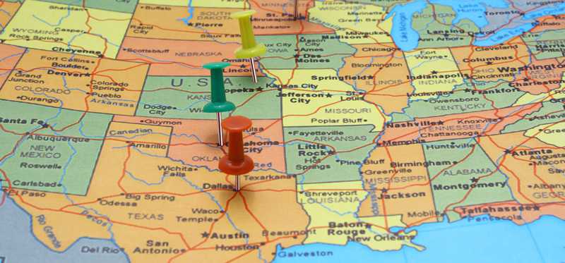 A map of the United States is shown, with a few pushpins in it.