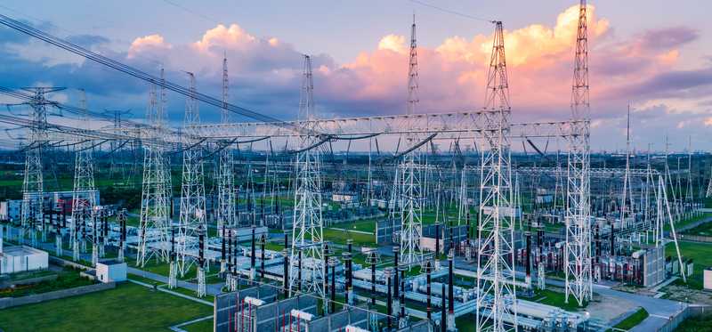 An aerial shot of a large electric substation.
