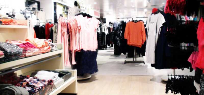 Various clothing racks and displays.