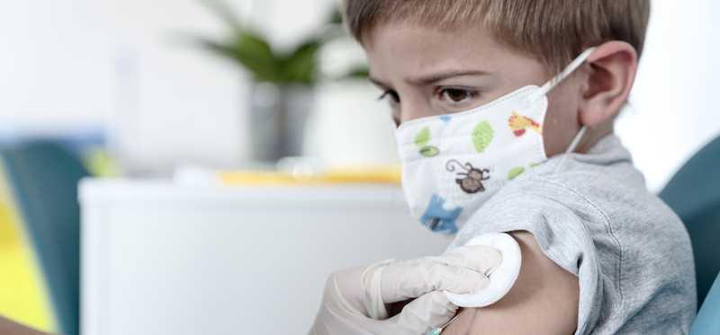 A child receiving a vaccination.