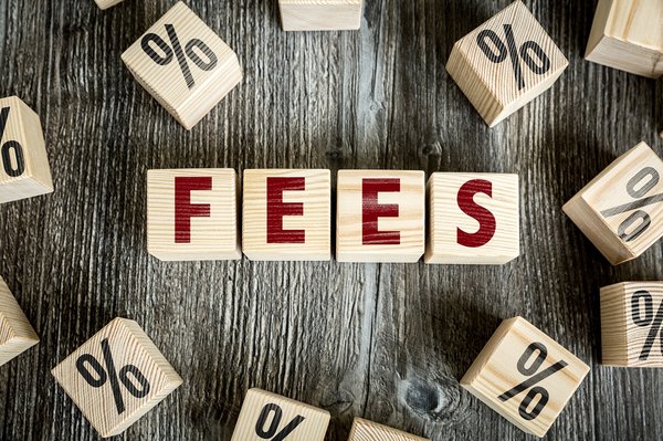 Fees spelled out with blocks surrounded by percentage signs.