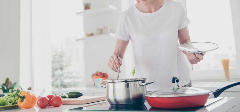 Woman stirring a pot