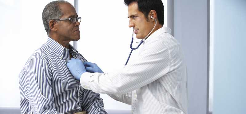 Doctor examining a patient.