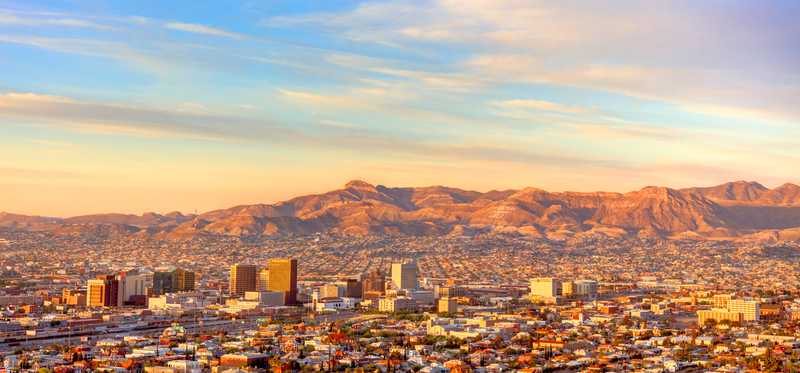Downtown El Paso, Texas, with mountains in the background.