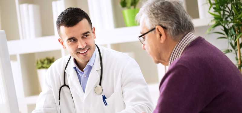 Person meeting with a doctor.