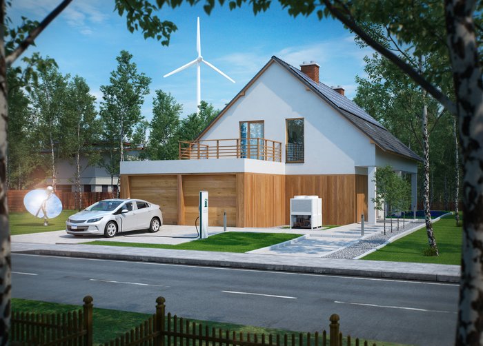 An electric car parked in front of a house with solar panels with a wind turbine in background.