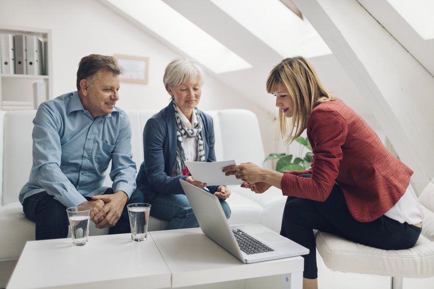 A family works with their financial advisor.