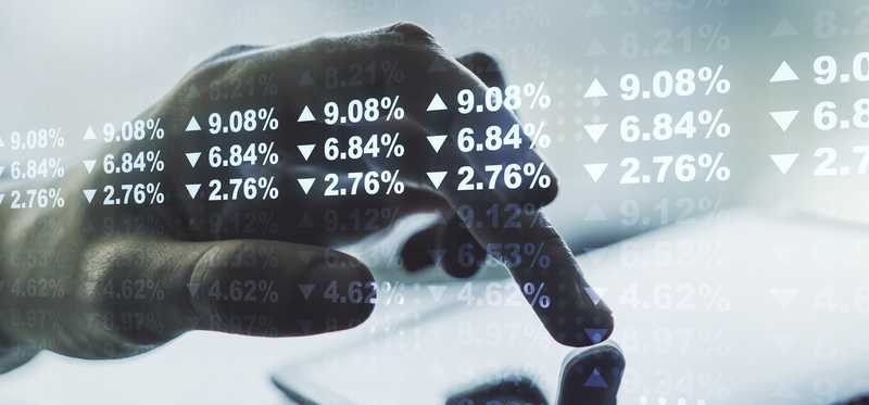 Person's hand using smartphone for finance