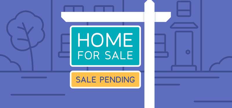 Sale Pending sign in front of a home.