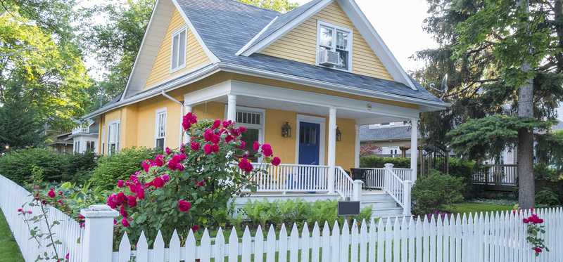 House with a white picket fence.
