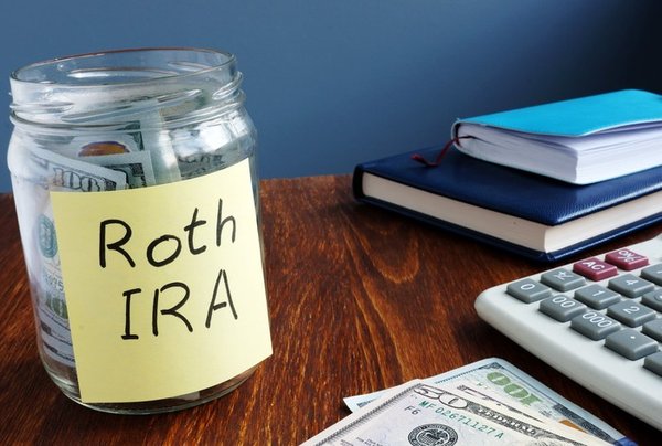Jar of money labeled Roth IRA