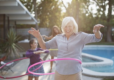 Person having fun with Hula-Hoop.