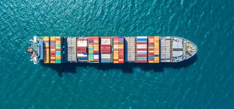 A cargo ship in the ocean.