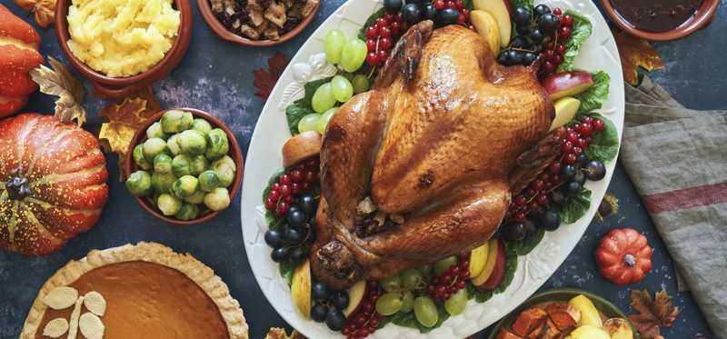 Thanksgiving dinner with turkey and sides.