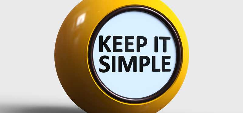 The words Keep It Simple in round object