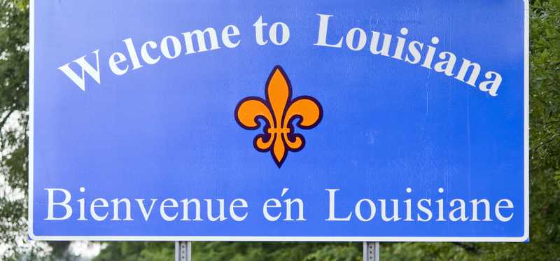 Welcome to Louisiana sign on highway.