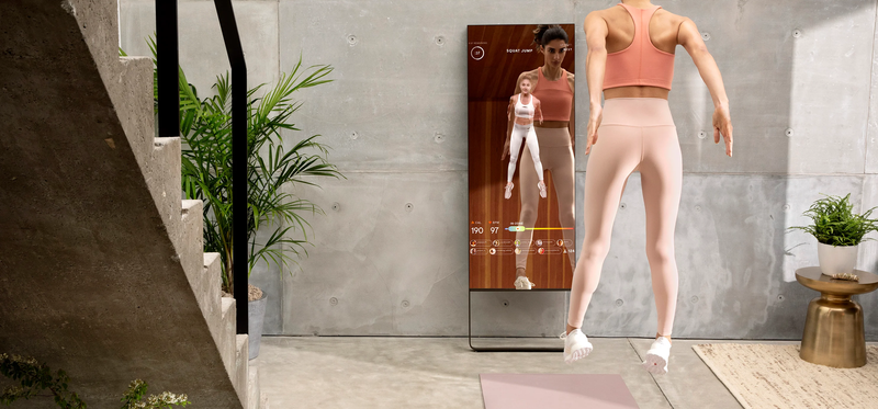 Woman exercising in lululemon athletica mirror