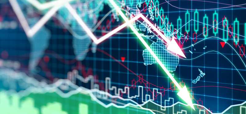 Computer screen showing financial markets crashing down.