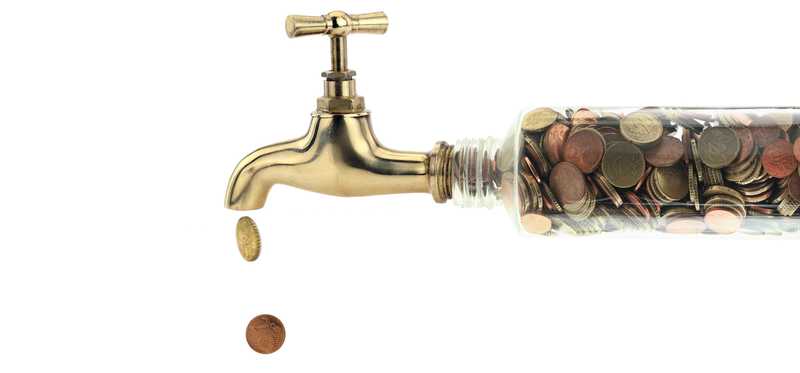 Money pouring out of faucet
