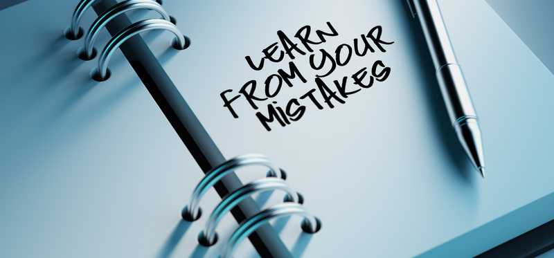 Notebook with the words Learn From Your Mistakes written down