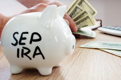 A piggy bank with the words "SEP IRA."