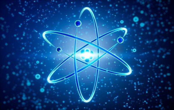An atom rotating around a nucleus.