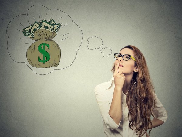 A woman with a bag of cash in a thought bubble illustrated above her head.