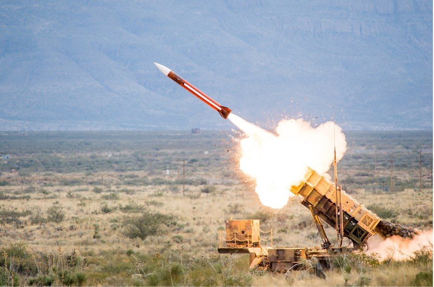 A Raytheon Patriot missile battery launches in the desert.