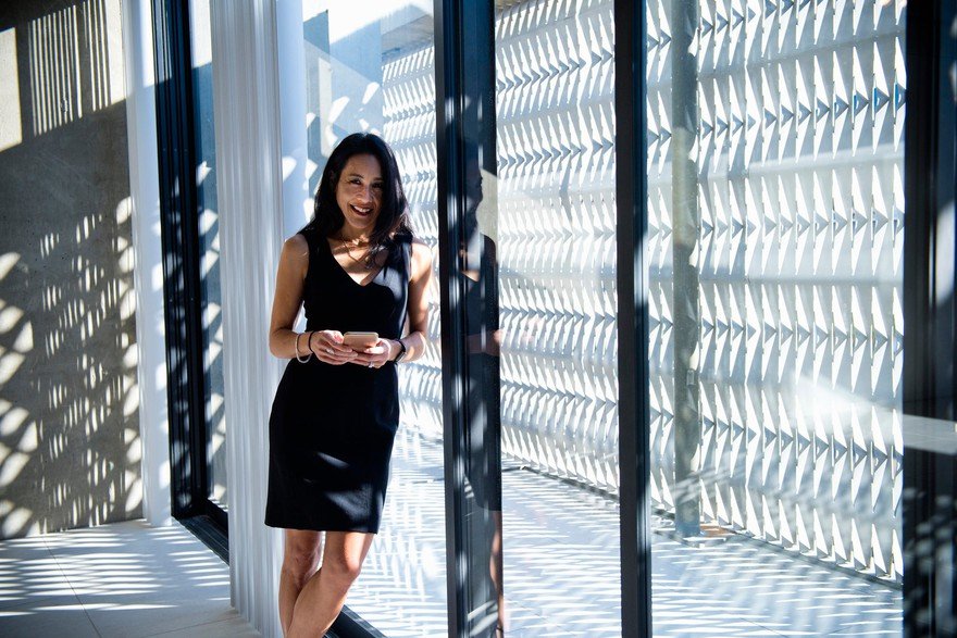 Asian woman in high-end condo.