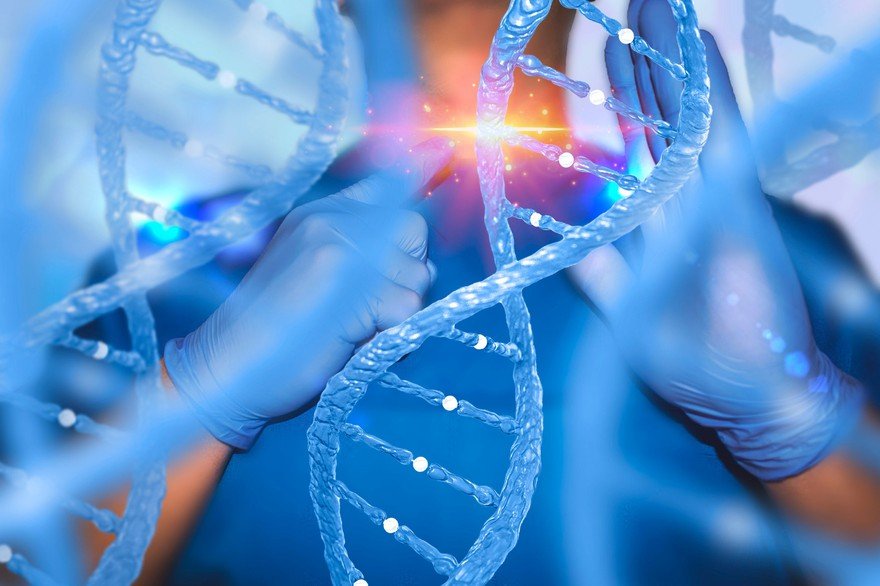 DNA with a healthcare professional in the background pointing to a lighted section of a DNA strand.