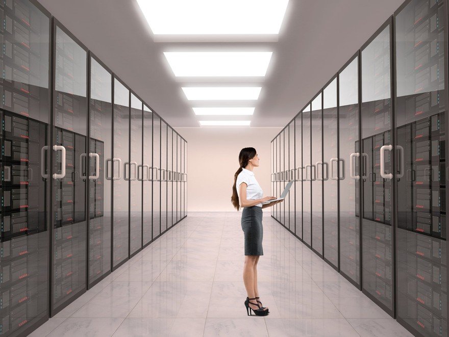 A person in a data center room.