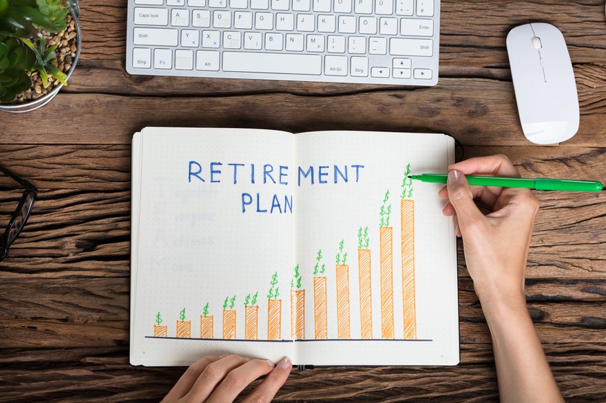 Hand drawing a bar graph labeled Retirement Plan.