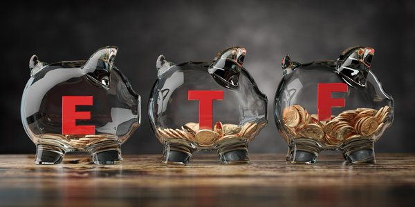 Three clear glass piggy banks that say ETF, and each has some coins.