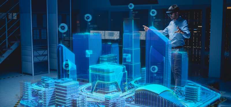 A person is interacting with a collection of virtual buildings.