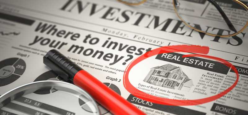Real estate circled in red in a newspaper article about where to invest money.