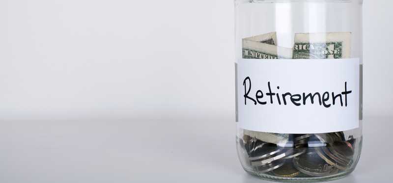 Glass jar labeled Retirement.