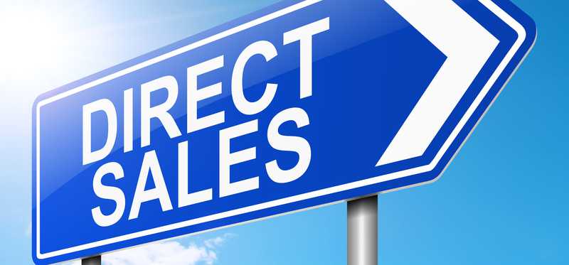 Sign with arrow reading Direct Sales.