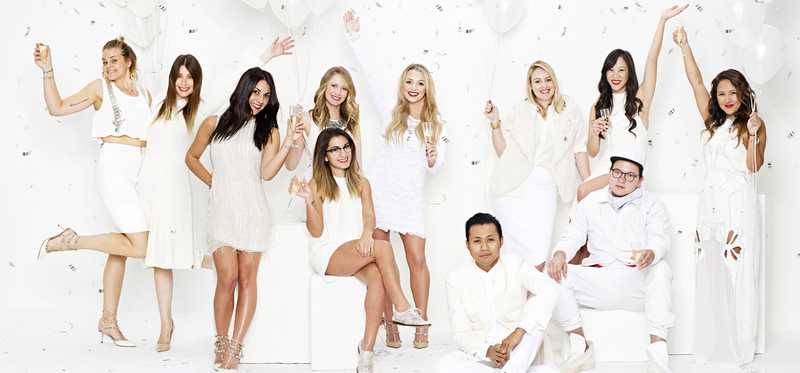 Models dressed in white Revolve clothing.