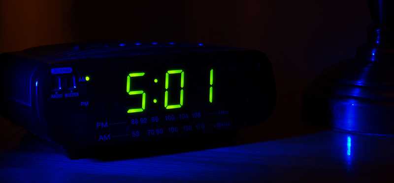Digital clock reading 5:01.